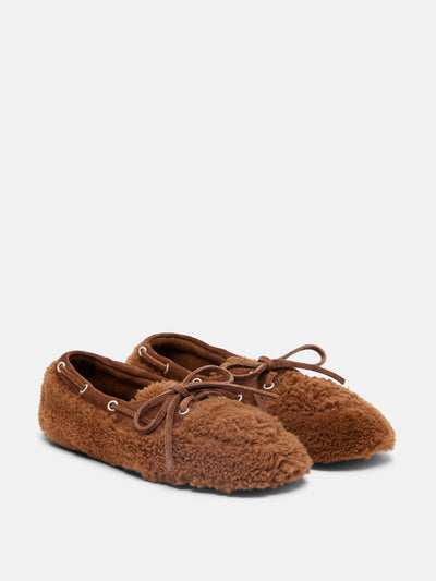 Miu Miu Suede-trimmed shearling boat shoes at Collagerie