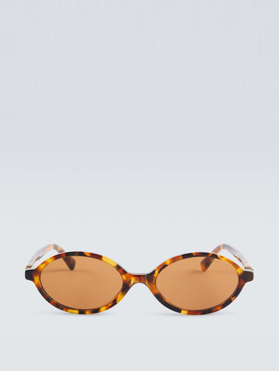 Miu Miu Oval sunglasses at Collagerie