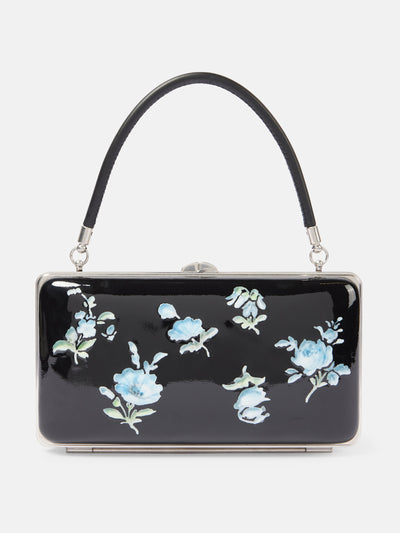 Prada Floral patent leather clutch at Collagerie