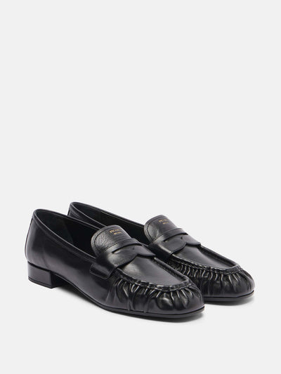 Prada Leather penny loafers at Collagerie