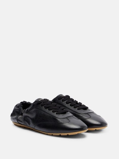 Saint Laurent Lewis leather sneakers at Collagerie