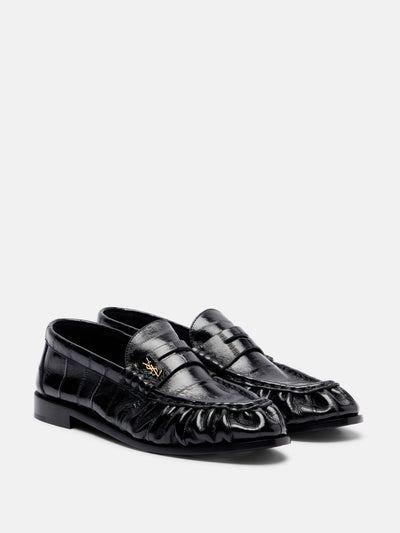 Saint Laurent Patent leather penny loafers at Collagerie