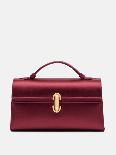 Savette Symmetry satin clutch at Collagerie