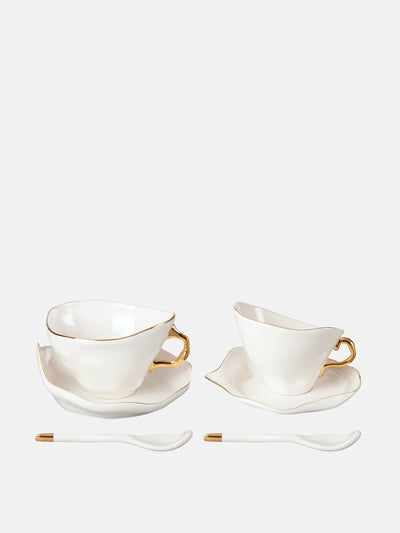 Seletti Meltdown porcelain teacups, saucers and teaspoons (set of 2) at Collagerie