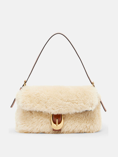 Staud Harlow shearling shoulder bag at Collagerie