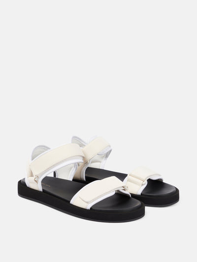 The Row White hook-and-loop leather sandals at Collagerie