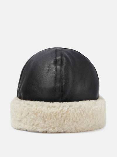 Totême Leather and shearling hat at Collagerie