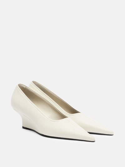 Totême Leather wedges at Collagerie