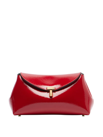 Totême T-Lock Mini patent leather clutch at Collagerie