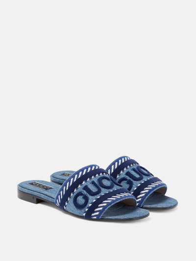 Gucci Jane denim slides at Collagerie