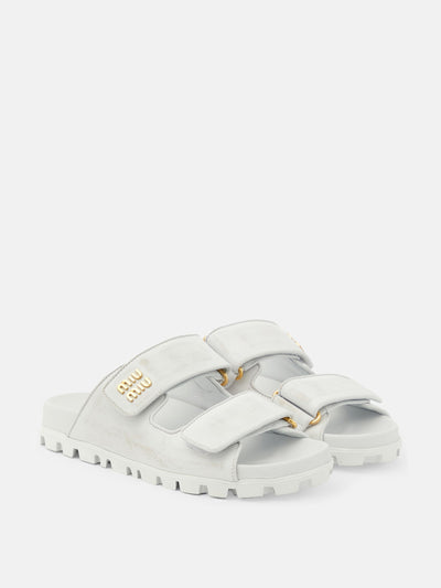 Miu Miu Distressed leather sandals at Collagerie