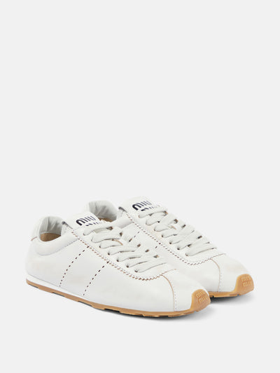 Miu Miu White suede sneakers at Collagerie