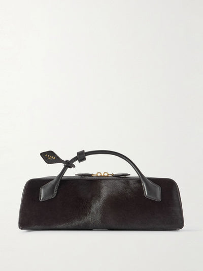 Alaïa Le Teckel leather-trimmed calf hair clutch at Collagerie