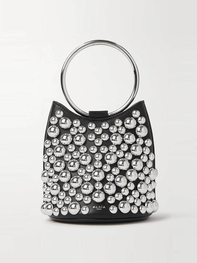 Alaïa Studded leather bucket bag at Collagerie