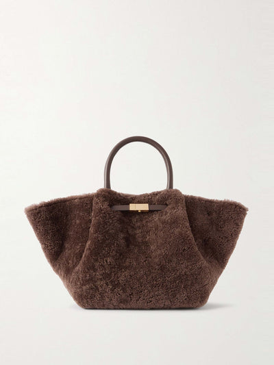 Demellier New York midi leather-trimmed shearling tote at Collagerie