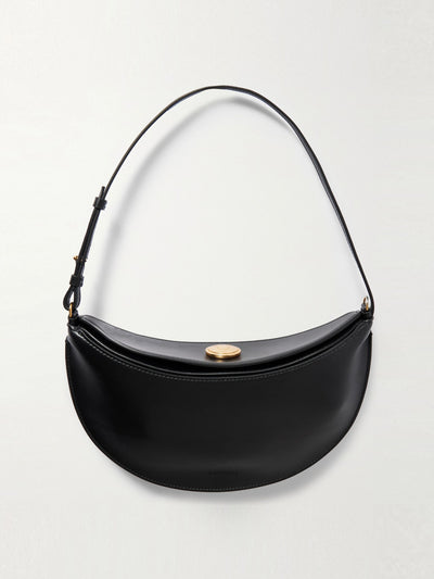 Jacquemus Le Petit Calisso Rond embellished leather clutch at Collagerie