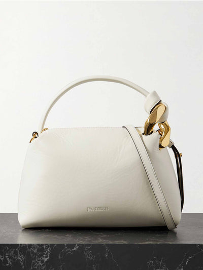 Jw Anderson Small chain-embellished leather shoulder bag at Collagerie