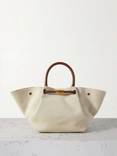 Demellier New York leather-trimmed canvas tote at Collagerie