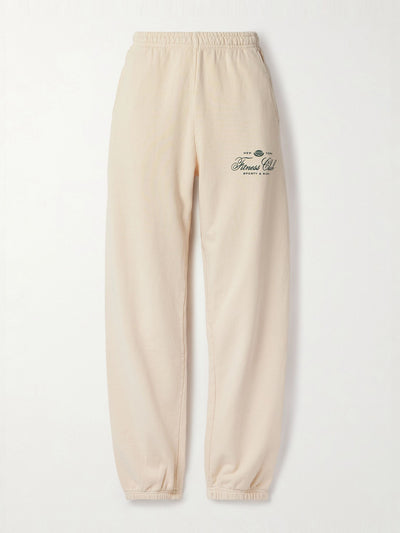 Sporty & Rich Fitness World printed tapered cotton-jersey track pants at Collagerie