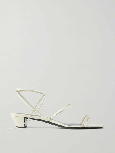 The Row White graphic leather sandals at Collagerie