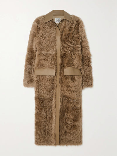 Totême Leather-trimmed shearling coat at Collagerie