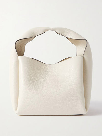 Totême White textured leather bag at Collagerie