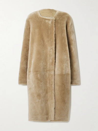 Totême Shearling coat at Collagerie