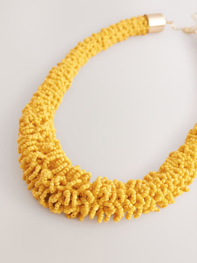 Next Yellow beaded tube necklace at Collagerie
