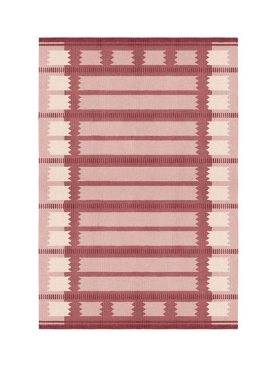 Layered Röllakan Iris wool carpet in raspberry at Collagerie