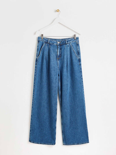 Oliver Bonas Blue pleated wide leg denim jeans at Collagerie