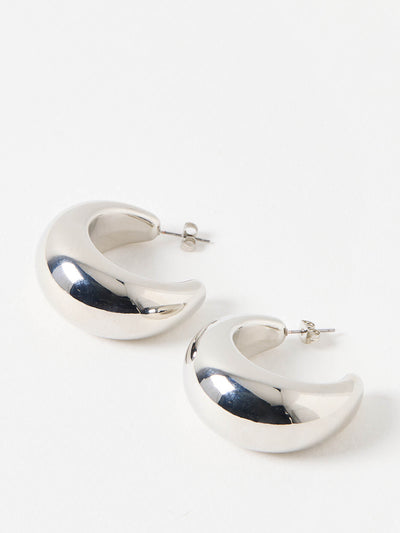 Oliver Bonas Bryony shiny silver tone chunky hoop earrings at Collagerie
