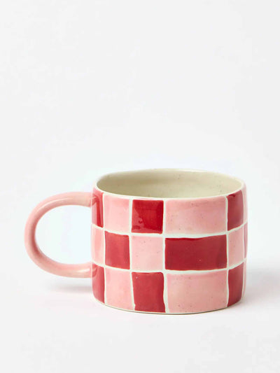 Oliver Bonas Chequerboard pink speckle ceramic mug at Collagerie