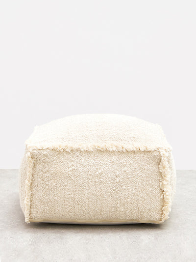 Oliver Bonas Issey white boucle fringed pouffe footstool at Collagerie