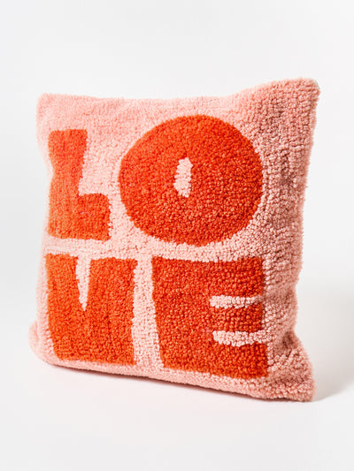 Oliver Bonas Love pink tufted cushion cover at Collagerie