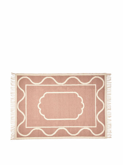 Oliver Bonas Mae reversible pink handwoven jacquard wool & cotton rug at Collagerie