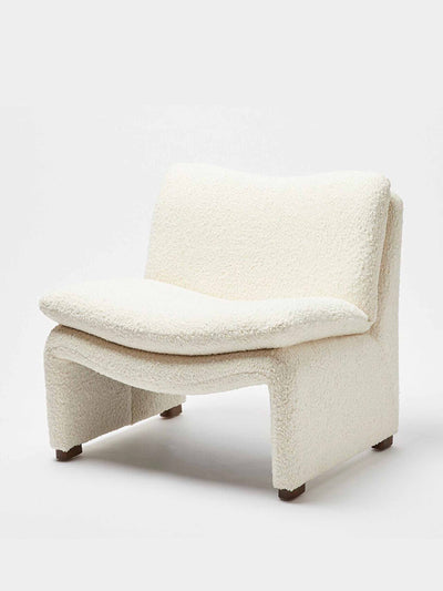 Oliver Bonas White faux sheepskin accent chair at Collagerie