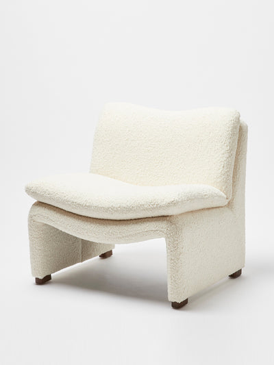 Oliver Bonas Maya white faux sheepskin boucle accent chair at Collagerie
