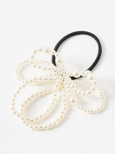 Oliver Bonas Monroe faux pearl bow hair band at Collagerie