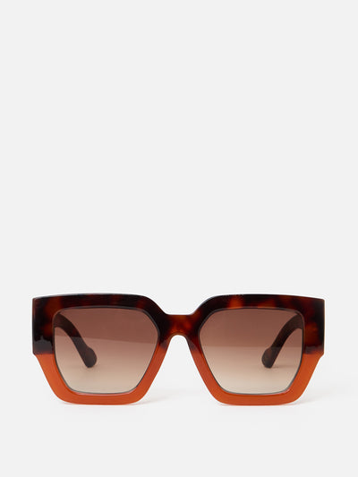 Oliver Bonas Orange & faux tortoiseshell angled square sunglasses at Collagerie