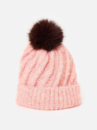 Oliver Bonas Pink twisted cable knit bobble hat at Collagerie