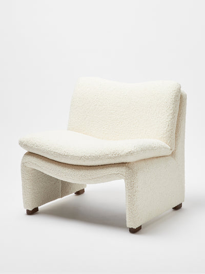Oliver Bonas White faux sheepskin chair at Collagerie