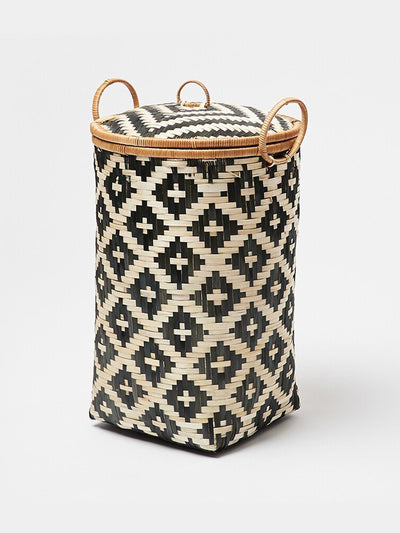 Oliver Bonas Woven black bamboo laundry basket at Collagerie