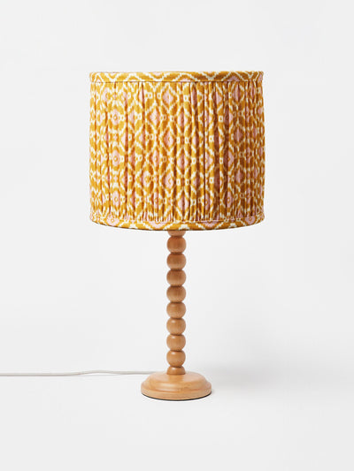 Oliver Bonas Yellow ikat bobbin desk & table lamp at Collagerie