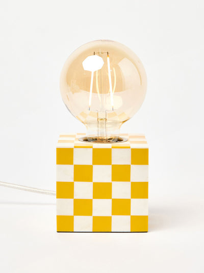 Oliver Bonas Chequerboard yellow resin desk & table lamp base at Collagerie