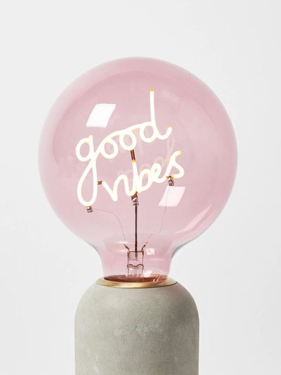 Oliver Bonas Good vibes pink light bulb at Collagerie