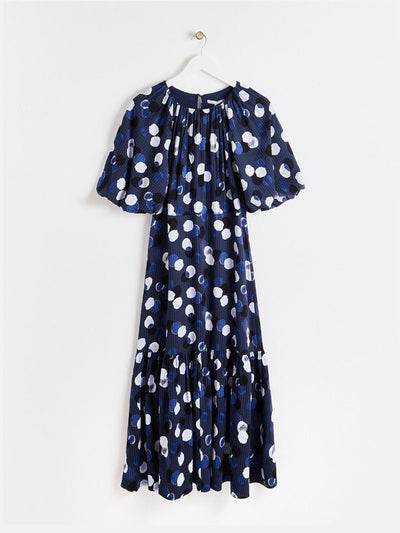 Oliver Bonas Inky spot puff sleeve blue midi dress at Collagerie