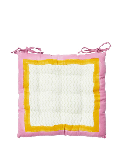 Oliver Bonas Lumu block printed wavy pink seat pad at Collagerie