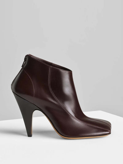 Phoebe Philo Tilt ankle boots in oxblood leather at Collagerie