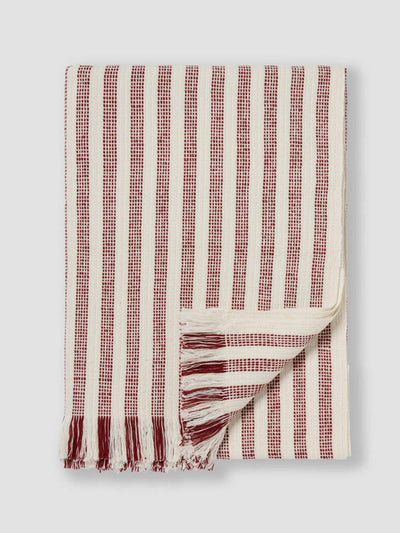 Piglet in Bed Rust red Pembroke stripe wool throw at Collagerie