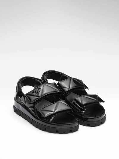 Prada Black padded leather sandals at Collagerie